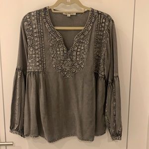 Gray 100% rayon top.